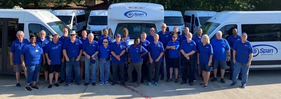 SPAN Transit drivers in front of their vans